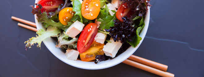 Salad greens and tofu, which are products certified organic by QAI.
