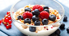 Bwol of granola with yogurt and fruit