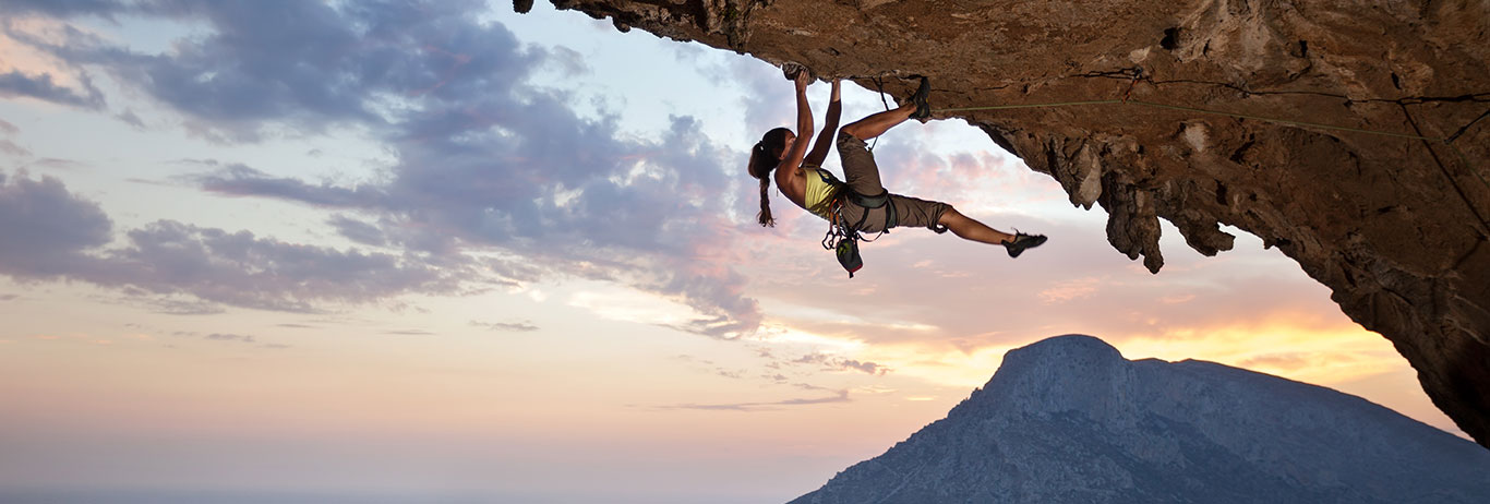 Woman rock climbing